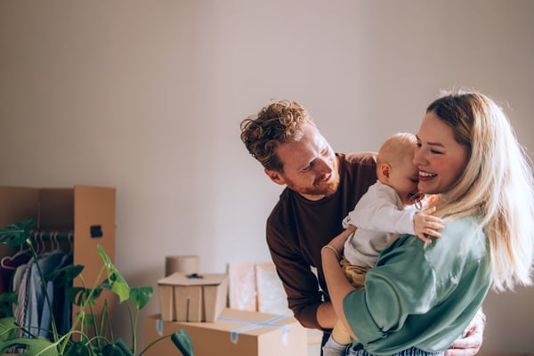 Couple holding baby
