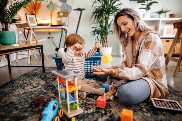 Mum and daughter playing with toys