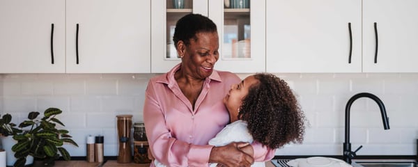 Grandmother and granddaughter laughing