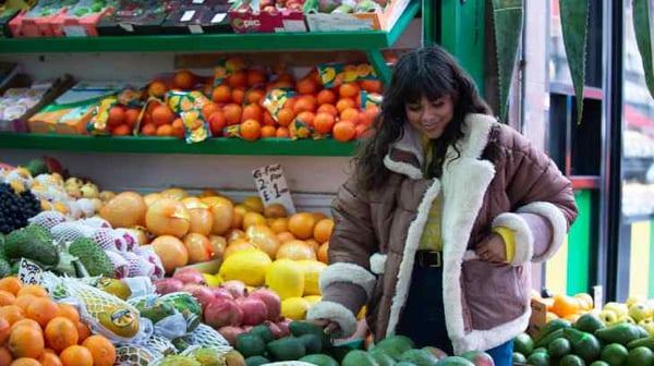 Woman at market stall