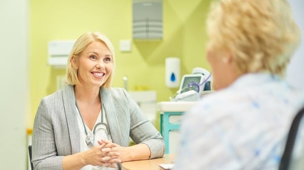 Female GP with her patient