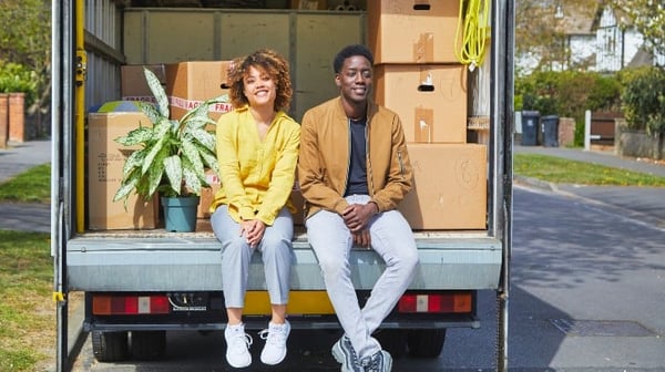 Couple sitting in removal van