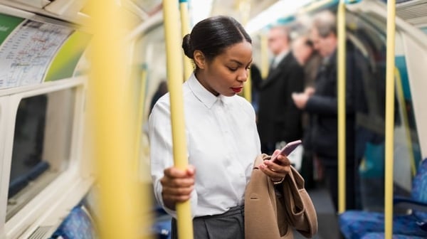 woman commuting on tube