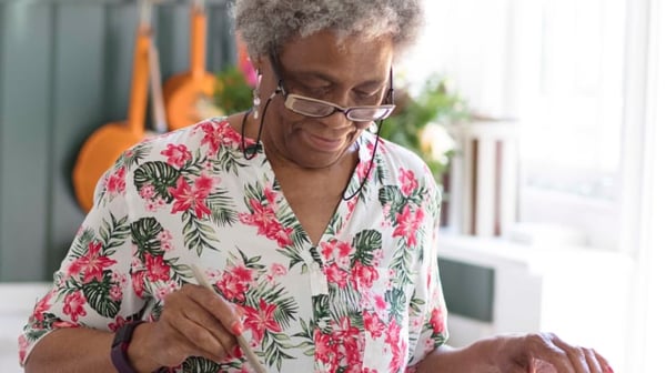 Woman in flowery shirt