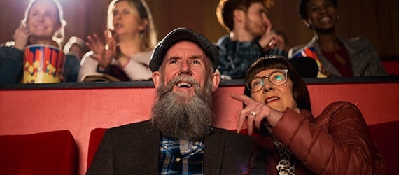 Image of two people at the cinema